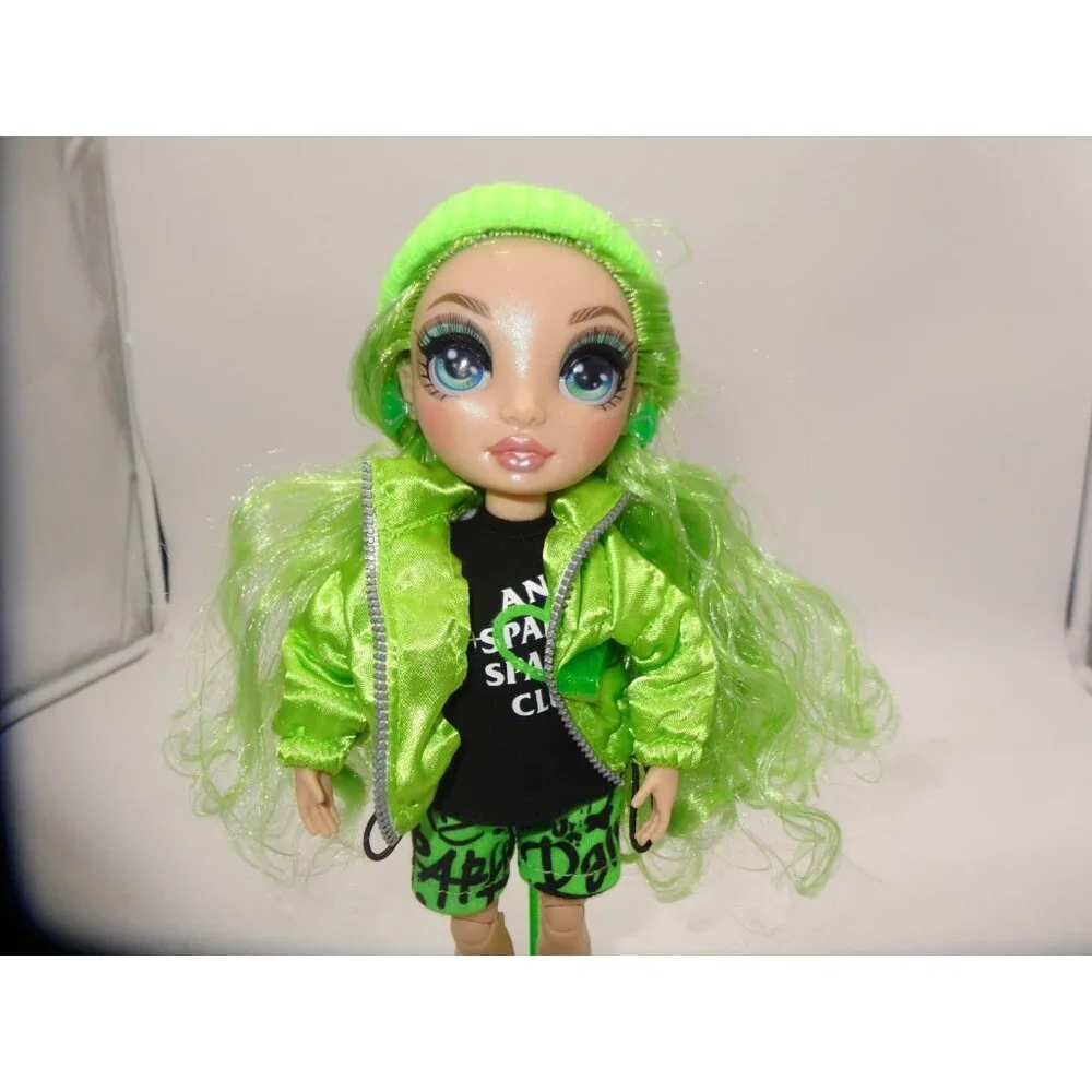 Rainbow High Jade Hunter Fashion Doll Dressed in Shorts Hat Jacket Top and Stand